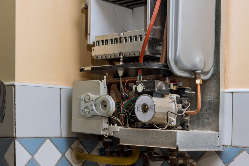 Servicing,A,Central,Maintenance,On,Heating,System,Boiler,A,At